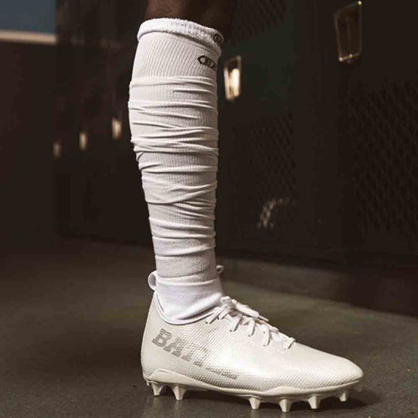 Side view of the Battle Youth White Long Football Socks.