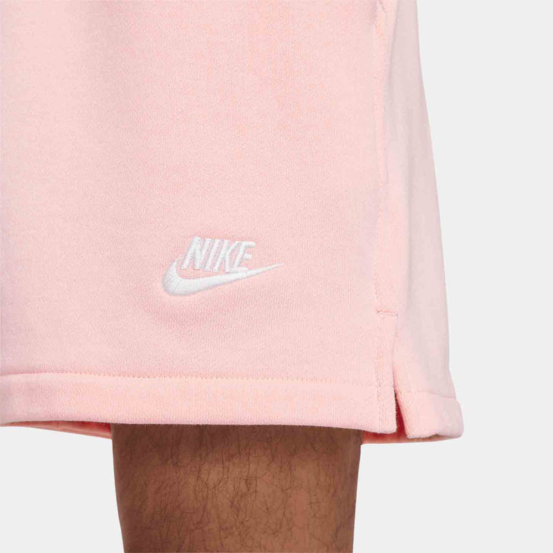 Up close view of emblem on the Nike Men's Club Fleece French Terry Flow Shorts.