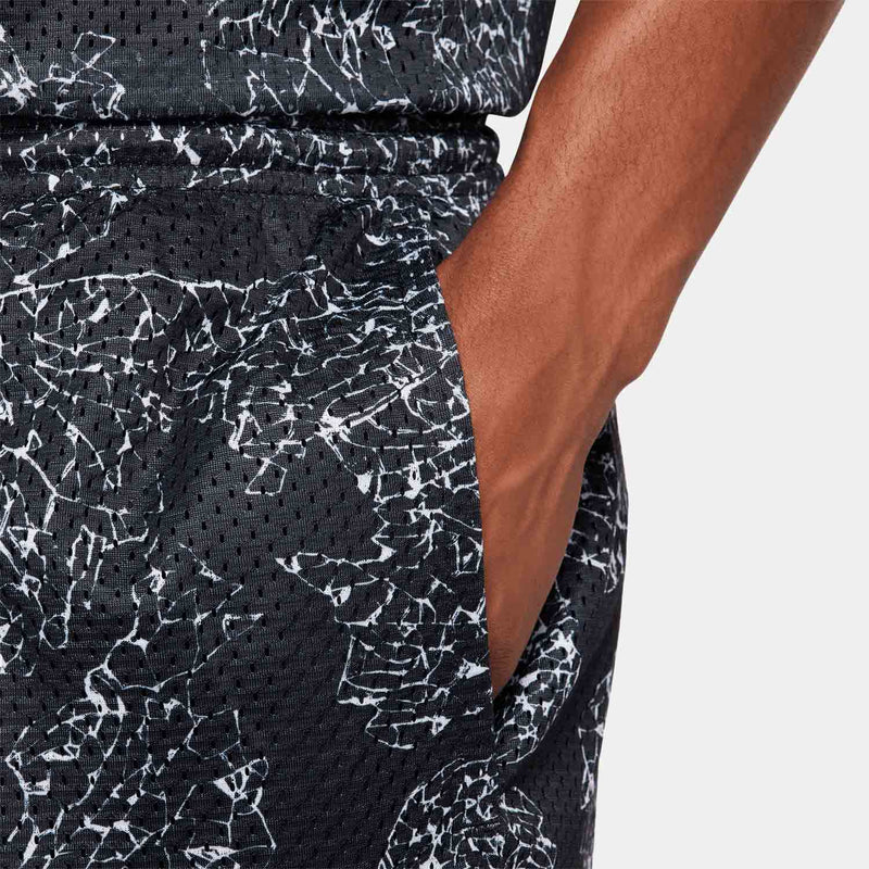 Up close view of pocket on the Nike Men's Dri-FIT 6" Reversible Basketball Shorts.