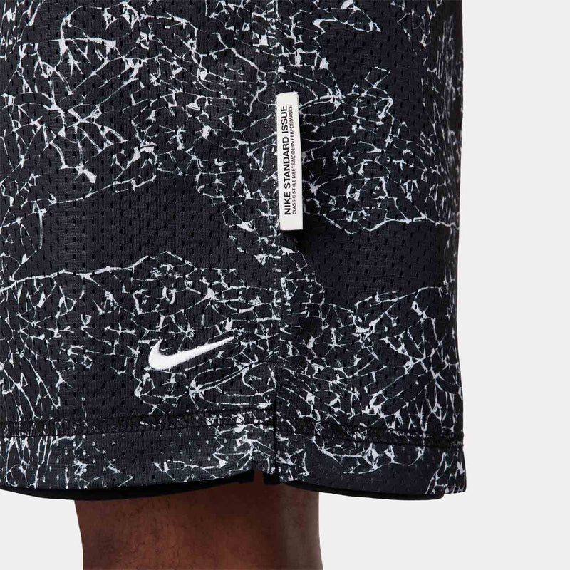 Up close view of emblem on the Nike Men's Dri-FIT 6" Reversible Basketball Shorts.