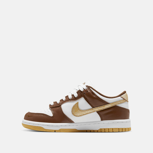 Side medial view of the Nike Kids' Dunk Low.