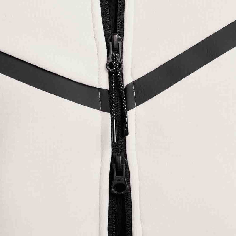 Up close view of zipper on the Nike Men's Tech Fleece Full-Zip Windrunner Hoodie.