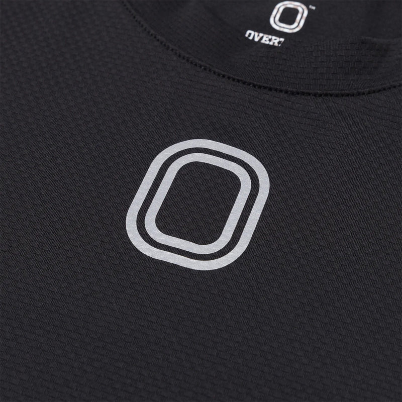 Up close view of emblem on the Overtime Kids' Tuff Performance Tee.