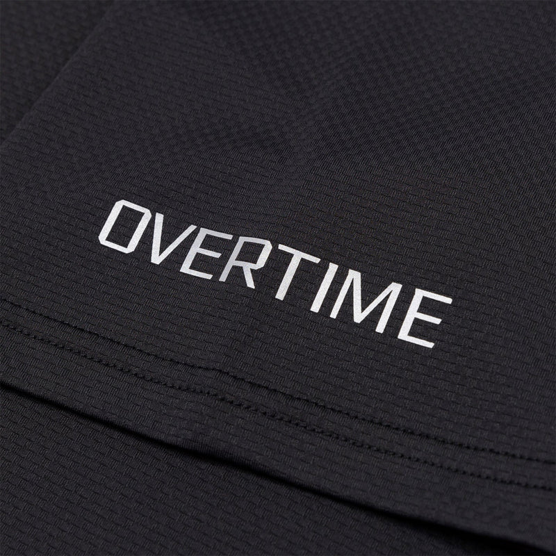 Up close view of emblem on the Overtime Tuff Performance Tee.